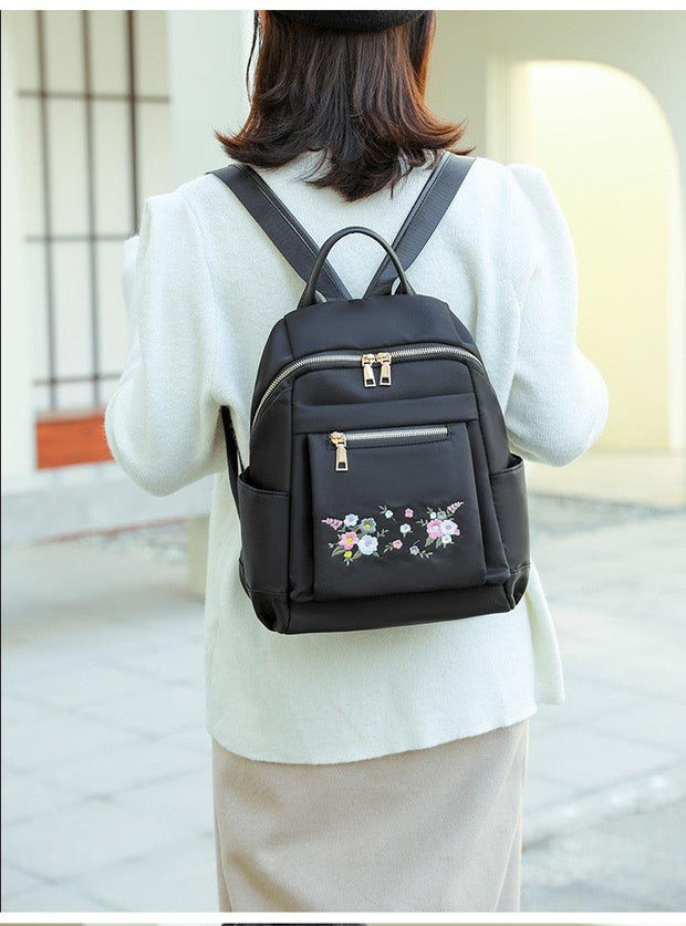 Rucsac negru cu flori Bloom